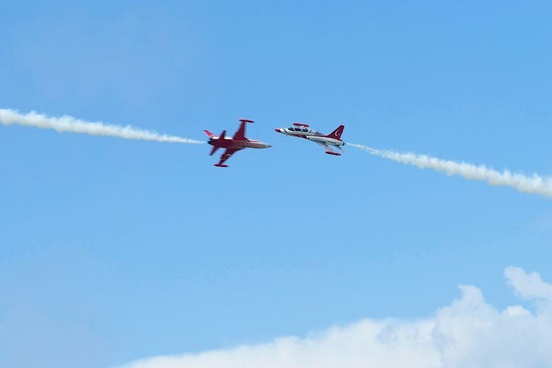 Tandems of planes flying towards each other. Stunts performed by Turkish Stars squadron planes, the only team in the world that evolves with eight supersonic fighters.